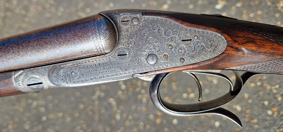 Thomas Bissell. London. This is the famous Vertical-Bolt action Bissell made for Rigby.