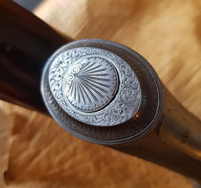 A Gun Stamped 'J. Taylor'.