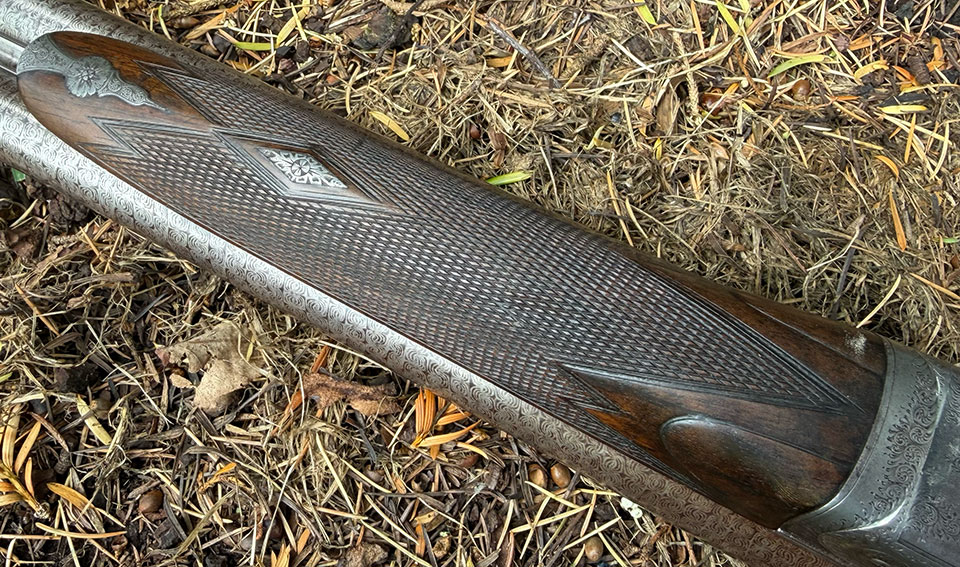 Forend fit and finish is first class. note the slightly shoulderd panels towards the iron.