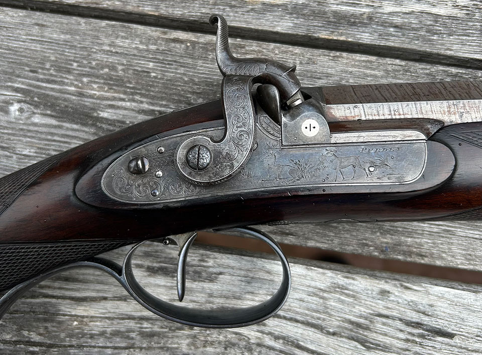 Typical Purdey engraving of the period by Peter Gumbrell, outworker to the trade. 