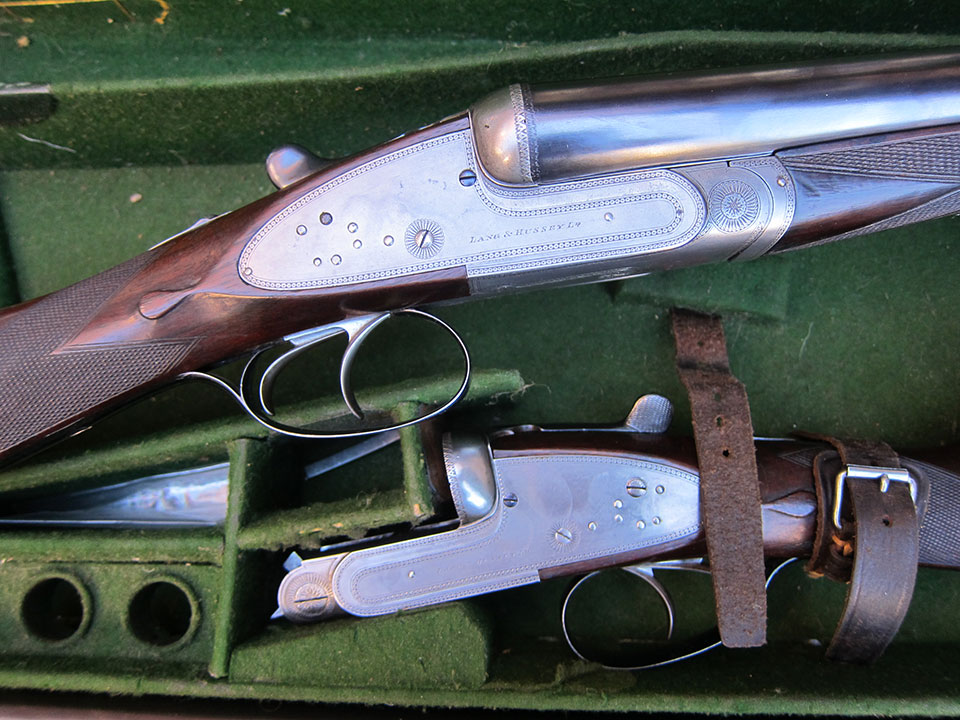 Modestly engraved guns are not uncommon, like this pair by Lang & Hussey.