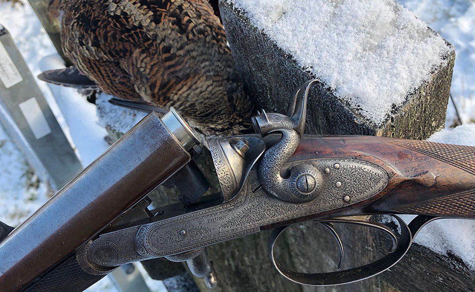 An old, open-choked hammer gun, snow on the ground and a woodcock in the bag.