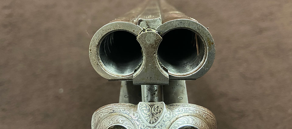 The breech end, showing the repair ongoing in the right barrel.