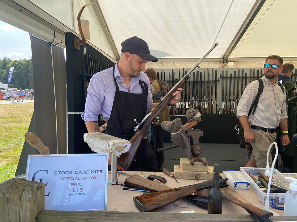 Rifle maker Ian Sweetman showing off his latest creation at the Game Fair.