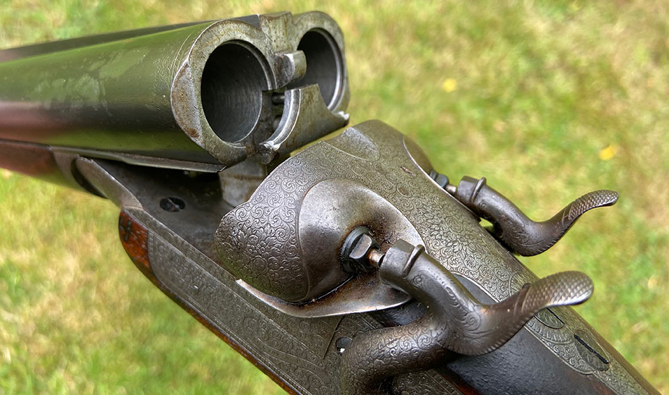 The breech open showing Purdey concealed third bite.