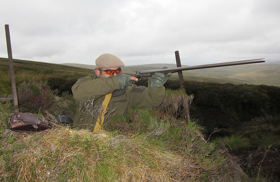 Kiri shooting his Holland & Holland 16-bore in Scotland.