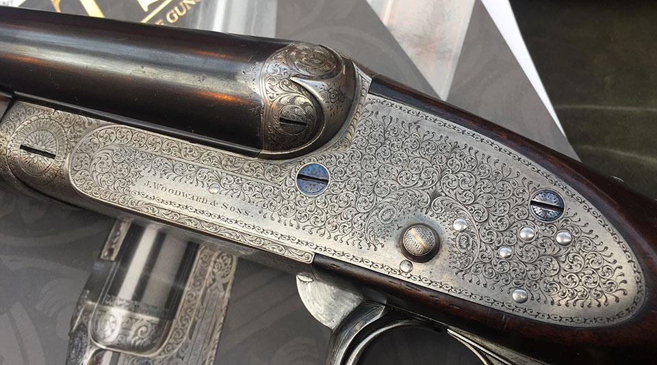 A hammerless under-lever Woodward 'Automatic' 12-bore shotgun.