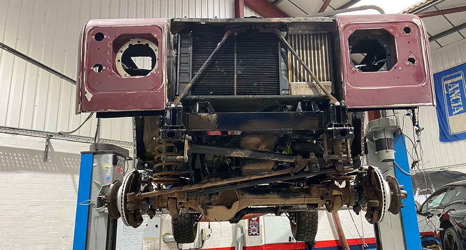 Once the new galvainised chassis was painted, along with the new bulkhead, re-building work began.