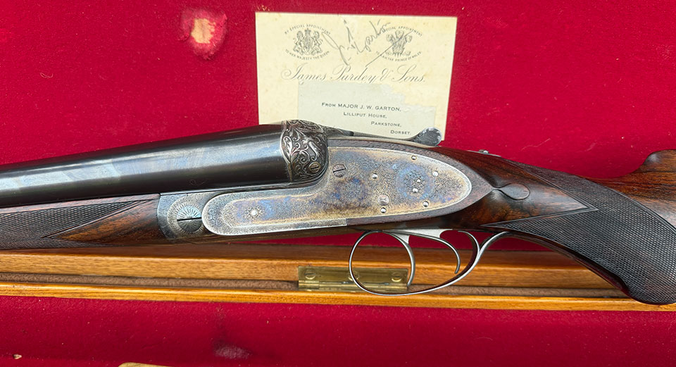 The Exhibition Gun is still cased in its original oak and leather with Purdey's scarlet lining.