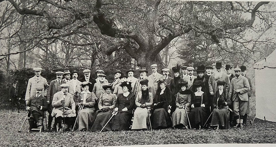 Ollie shooting at sandringham with King Edward VII. Olly is standing second left of the King..