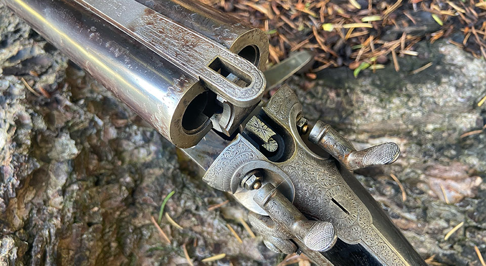 Hammer rifle by Rigby with Jones under-lever and rising bite action.