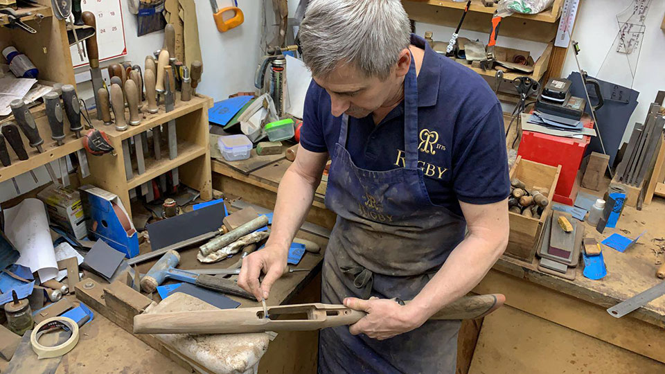 In the workshop, the gunmakers work on in isolation.