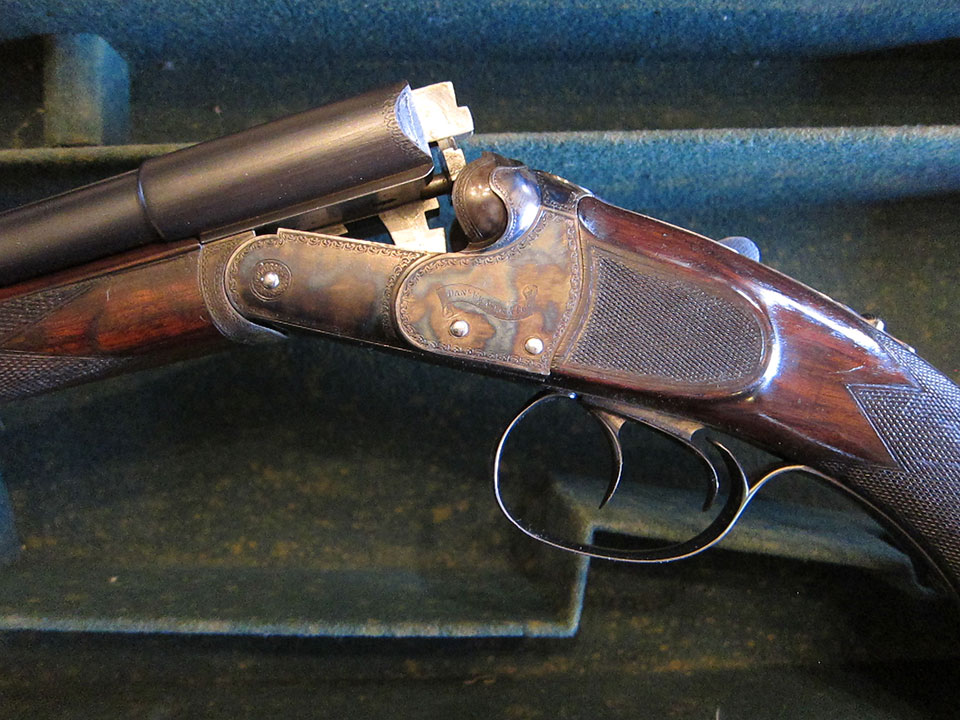 A Daniel Fraser double .303 boxlock rifle.