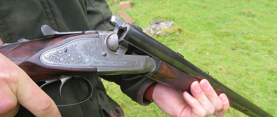 Another Rigby double rifle with the vertical bolt action.
