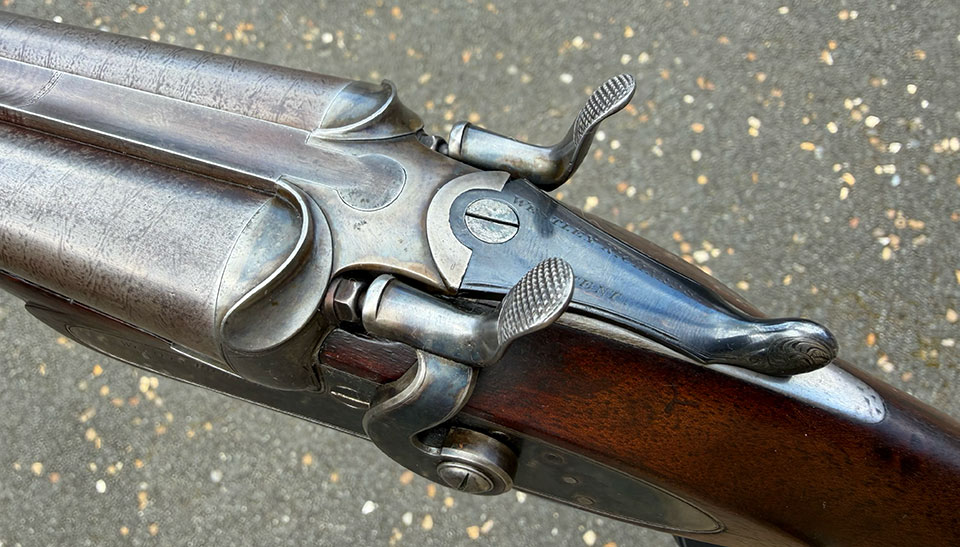The doll's head fits perfectly into the action, jointed on the circle and secured by the top-lever's sliding bolt.
