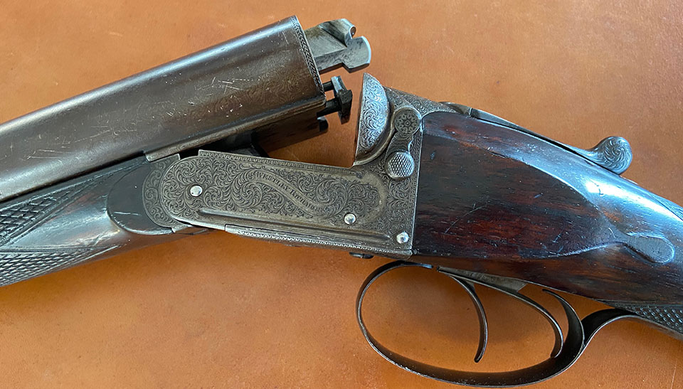 Westley Richards with patent intercepting safety bolt, operated by twin external levers.