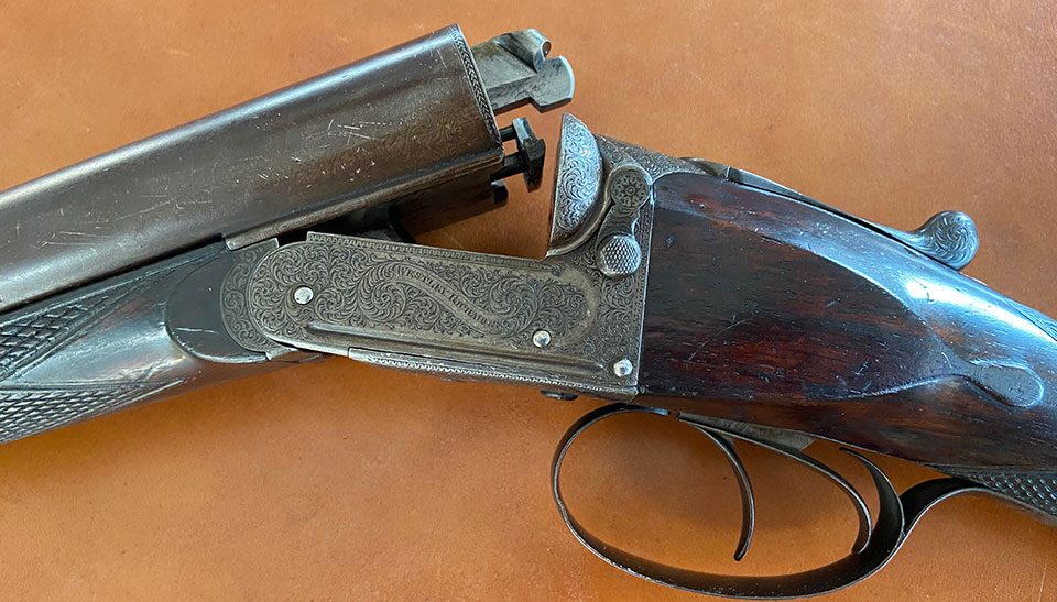 Westley Richards with patent intercepting safety bolt, operated by twin external levers.