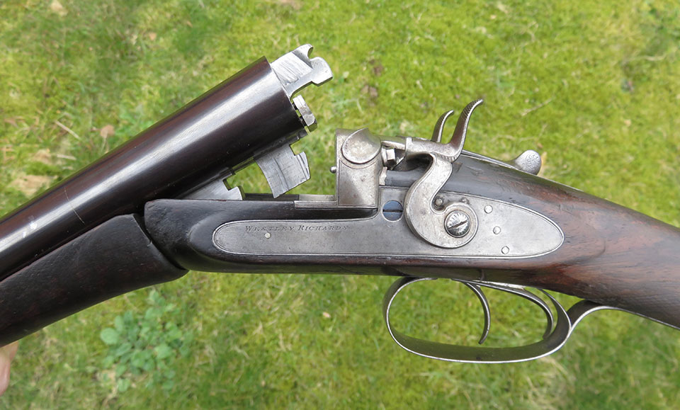 Later guns added the 1863 patent Purdey double under-bolt, making the bolted doll's head a third grip.