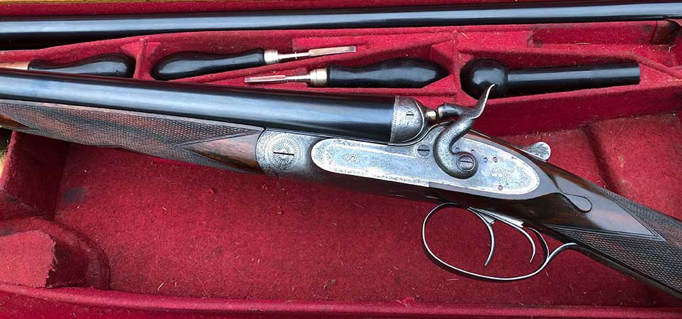 Purdey heavy game gun with two sets of differently choked barrels.