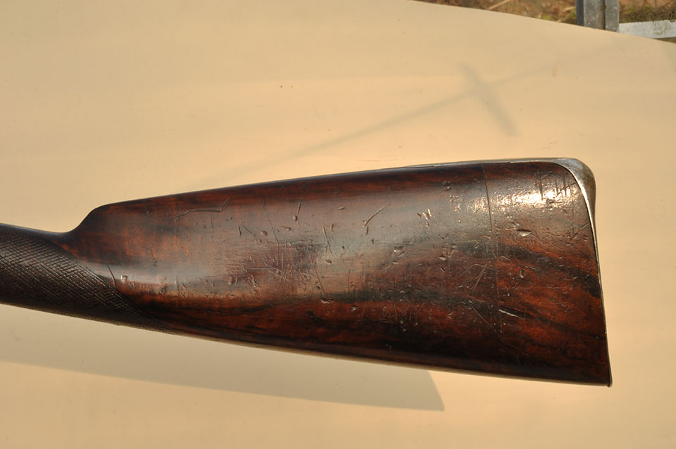 The stock on this gun displays the skill of its maker , using a wider shorter heelplate and achieving an gracefull shape, notice too the lengthened wood with the original cut off piece.